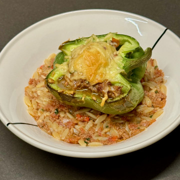 Green bell pepper with minced beef and served with orzo