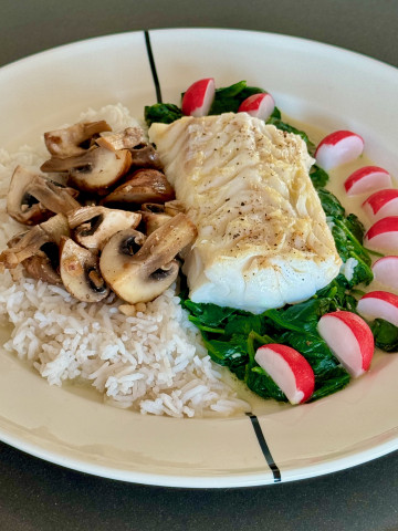 Easy white fish on wilted spinach