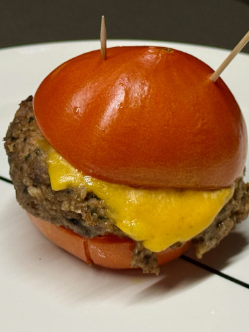 grilled eggplant patty in a beefsteak tomato
