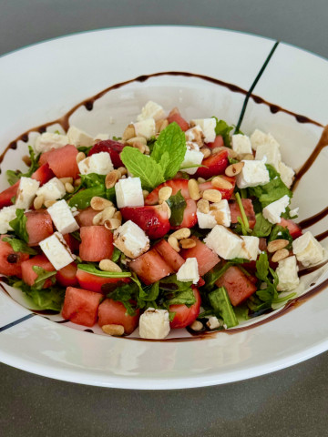 Summer salad with watermelon and strawberries